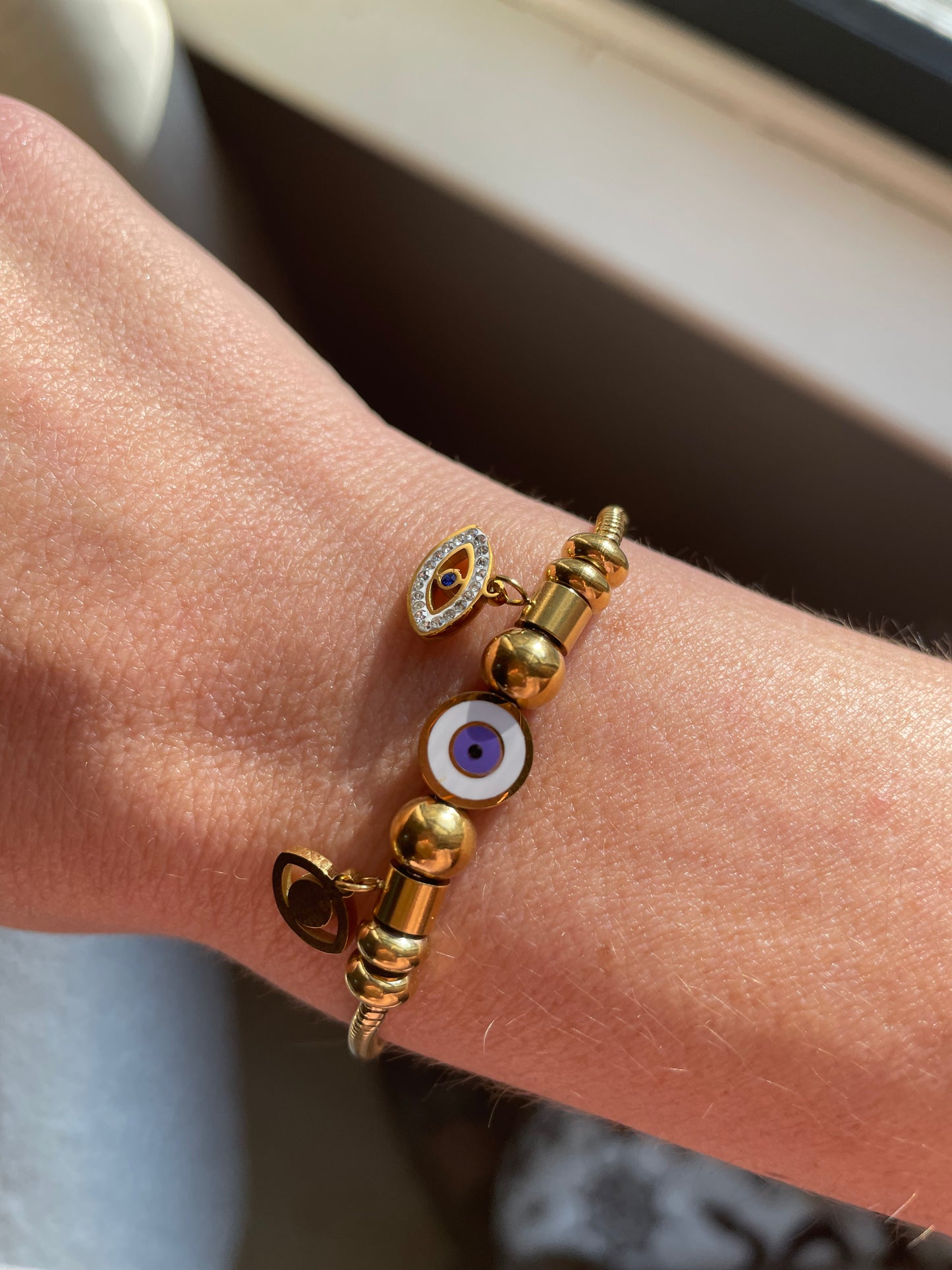 Evil Eye Rope Clasp Bracelet with Purple Accent charms