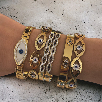 ANNA || Evil Eye 18k Gold Bangle with Cubic Zirconia Eye Braid Design